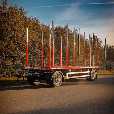 DOLL timber transport platform trailer A2P-LZ66 on the road